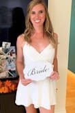 I wore this for my bridal shower! It is super cute and comfy, only downside is it did fit a little loose and it wrinkles SUPER easily. - Savannah N.