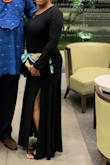 The dress was a near perfect fit the sleeves were just a little loose. But it was beautiful. Long enough to hide the tiny heels I settled for and still showed the scalloped design I liked so much. - Travon G.