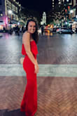 Such a classy, and subtly sexy jumpsuit. Wore it for a girls night out downtown and got lots of compliments. It fit every where except it was very long. I will probably get it hemmed for the next time I wear it. I'm small-chested and didn't need a bra, but wore a sticky bra to help create some cleavage. Other than the length, very happy with this purchase! Good thick material. - Katelin H.