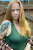 I love this shirt! It has an extremely soft material. My favorite part if you do not have to wear a bra with it. You can dress it up or dress it down. It's super cropped. I am wearing a size medium in the photos. - Cortney A.