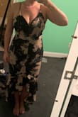I ordered this dress as a long shot option for an upcoming wedding and was so happy with how it looked when I tried it on! It flattered my curves and made my waist look tiny. The hem in the back drags a bit, but shouldn't be an issue once I add heels. - Melanie R.