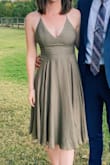 I bought two different dresses from Lulus for a wedding. This is the dress I went with. The almost corset-like ties in the back allowed me to adjust the dress to my waist. I will be wearing it again. - Serena T.