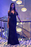 Loved this dress. It fit perfectly. I wore it for a cruise on formal night. I ordered the medium according to other reviews saying it ran small but than I also ordered the small just in case... thank god I did! The small fit perfectly! I'm 5'6" and 125 pounds. I wore 2 inch heals with it as well and it was still long enough on me. - Erin S.