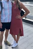 I bought this dress for a recent trip to London because I wanted something casual and comfortable to wear around town but didn't want to look too dumpy. This dress was PERFECT. I walked around town for probably 12+ hours in this and was comfortable the whole time. I'm usually between a small and medium in Lulus and ordered a small and I'm glad I did because this definitely runs a little big. As other reviews have stated, the armholes run a little big but I just wore a cute sports bra with it and thought it looked fine. This has definitely become a staple in my wardrobe. - Laura M.