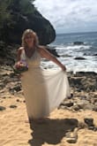I absolutely loved this dress for my beach wedding in Hawaii. It has a beautiful top with gold embellishments, a high waist and three layers. I had to have the dress hemmed and altered in the chest area. It was a little baggy up too so my local dry cleaner took it in and hemmed it for $68. Well worth it for a perfect dress for my perfect day. - Diane D.