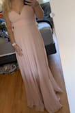 I love this dress as it is simple, classy, and sexy at the same time! I got a medium, and it fit perfectly. However, it was really long and I am 5'4". Thanks for the perfect Ball dress Lulus! I will definitely order here again. - Megan S.