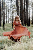 This dress was very pretty for a senior photo shoot. Had to pin the straps but my daughter is very short! Great material! - Melissa J.