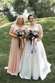 I wore this as the maid of honor to my best friend's wedding. I originally ordered a medium because that's my normal size, but being a 36 H as a bra size I had to significantly order up. That being said, with it being a wrap dress, I was able to tighten it to fit my waist and my chest!! I received so many compliments. It's a beautiful dress! - Kailey B.