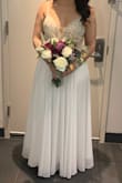 I wore this dress for my elopement and it was the best thing I could've done. The dress is even more beautiful in person and if I were you I would order it right now! You will not regret it! I might wear it again for my small church wedding. I had to get it hemmed because I'm short and the dress was way too long. Please do yourself a favor a buy this dress you will not regret it! - Gabriele F.