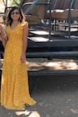 I got so many compliments when I wore this dress. I would definitely have it shortened because it was too long for me. Even with tall wedges, it was still long. It's so pretty so I decided to keep it. Also not the best dress to wear on a safari wine tour but I made it work! :-) - Rachel M.