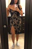 I had intended to buy this dress for a wedding but it was a little too much with the slit. It can work for a date night though! Love this dress, it fits like a glove! *disregard my socks* - Lourdes G.