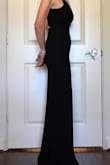 I originally ordered a M but it was a little too large everywhere. Returned it for a S. This one is very snug but I think it's supposed to fit snug. You can see this dress does show a stomach bulge if you have one. Very well made, heavy weight stretch fabric and I love the back detail. I am a senior and wanted something to cover my arms so I made a lace bolero with an open back to show the dress back detail. This dress will be perfect for formal nite for our 50th wedding anniversary cruise. - Arla N.