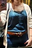 Great top! It is a beautiful color! It is a little cropped, so it doesn't tuck into my "normal" jeans, but looks great with anything high waisted (if you want to wear it tucked). It is fitted across the breast with a normal bra. With a bralette is it more loosely fitted across the bust. My pic doesn't do it justice! - Gabrielle W.