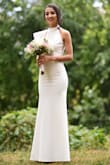 The dress is awesome. I received so many compliments. It is too long for my height but I wore high heels. I didn't need to make any changes. The fabric is nice. - Daniela C.
