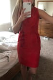 This dress is very pretty, but I was just hoping the material would've been a bit better. I was assuming it was going to be a stretchier, thicker material but it wasn't...which is why I returned it. - Emily F.