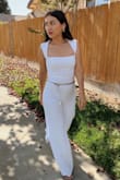 When I got my jumpsuit, I was nervous because it looked really long. After trying it on with some heels the fit was amazing. I honestly really loved the quality of the fabric and how comfortable this jumpsuit was. I got an XS and the fit was perfect! - Lily V.