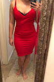 I love this dress and the way it fits. I was worried about the length a little bit because I am short but it hits right above my knee which is perfect. The quality is great and I love that the straps are adjustable. Definitely a new favorite. (I just happened to be wearing a black bra when I tried it on but I'll definitely wear a different one when I wear this out.) - Hayley J.