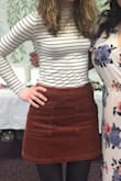 This shirt is super soft! It is somewhat thin, so it's not super warm, but the fact that it can goes with so much, makes up for it. I order both a Small and an XS. They both fit well, but I kept the XS because it hugged my shape better. Such a versatile piece to own; dress it up or dress it casual. - Olivia C.