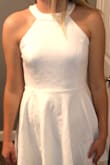 The dress is so gorgeous! It is a *little* loose around my waist, but definitely nothing noticeable. I wanted to size up to make sure that it would be comfortable to move in and long enough in length. Very excited to wear it for graduation! - Kayla M.