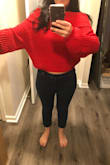 Really unflattering sweater, the torso is so short that anytime I bring my arms up a little bit, it rises above my belly button. If you're skinny and can wear high waist, this will be fine for you. The color is red red and not strawberry red like the picture, there is no pink hue at all. The arm pits hang down to the waist. Just not cute, returning. - Shanna W.