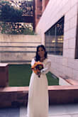 Perfect dress for a small wedding! It was affordable and so beautiful! I felt like such a princess!! The only thing I would say is that the arms were a tad bit big but I wouldn't change a thing everywhere else was snug! - Alexis G.