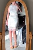 I love this!  It looks perfect for my rehearsal dinner and I will definitely wear it again after! It was loose enough that I could have gone down a size, but not loose enough to exchange. - Nicole M.