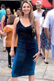 Show stopper for sure! Love the ruching because it hides everything. Clings to your curves and is a stunning color! Only complaint is that was a little tough to take big steps! :) - Jasmine L.