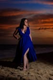 I ordered this dress for our Engagement photos and it fit great. I did have to get it hemmed because I'm short. 
I felt so sexy and elegant in this dress! The color and material are beautiful! I might buy this dress in a different color because it is so flattering! - Talette H.