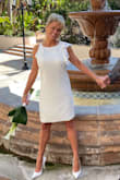 The dress fits true to the measurements! It's beautiful, lined and great quality. - Kimberly S.