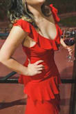 Who doesn't love a red dress? You will definitely catch some attention wherever you wear this dress. Material is great, somewhat stretchy. It was a tad small around my chest but usually happens with any dress due to my back. You can wear it without a bra if you can pull that off. It's not see-through. - Maritza P.
