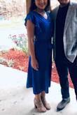 I really looked this as it was comfortable and flattering. The tie waist is very feminine, the length is classy and appropriate and overall I loved this purchase. - Maite L.