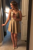 This dress was perfect for my golden snitch Halloween costume. It's quite low cut in the front, as well as the back, so you can't wear a bra. Overall it's really cute, and the pockets are great! - Courtney B.