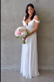 This dress was wonderful for my wedding. It fit perfectly! I wore 4" heels and didn't need to hem or alter it in any way... - Valerie H.