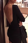 I bought this for my sister (so ignore my size details). She had it hemmed to a mini length which I thought made the dress even better! She thought the fabric was great, felt very secure and high quality and the detailing at the base of the open back is amazing. - Jessica A.