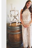 I absolutely loved this for my bridal shower! I'm typically a medium in pants, but after reading the reviews I decided to go with a large. It was not quite as fitted in my chest, but it was perfect through my hips and thighs. I got so many compliments! Highly recommend! - Lauren L.