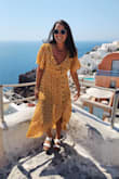 I bought this dress for a trip and i absolutely adore it! It does run a little small in the waist and a little large in the bust for me but it still worked and I love when I get to wear it. I always get so many compliments on it. I would recommend it to anyone looking for a fun, day-time dress! - Meredith S.