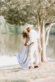 This dress is absolutely amazing!  The quality is far more than I expected and I now only buy my dresses from Lulus.  I bought this for my engagement shoot and it was perfect.  It was a little long even with heels but if I was going to wear it elsewhere I would just get it hemmed. - Ashley R.
