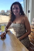 This dress is a little wild but very classy.  It is very lightweight and silky.
Felt great in this dress. - Ana P.