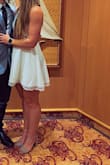 This dress was super cute and comfy. I love the halter style and the dress was long enough on my tall body. Heavier material which is nice and feels like it can stand up to wash and wear. It does hold wrinkles though. - Rachel H.