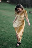 I absolutely LOVED this dress! Perfect for any winter occasions - both bold and classy. I received so many compliments on this dress. I have a pretty curvy hips and it worked out great, although it would have been better with some spanx. Definitely recommend. - Kait D.