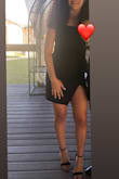 I wore this dress to a wedding and it was great. I am pretty tall so I ordered a large to be on the safe side in my time crunch. It wasn't too short even with the slit. It fit great in my bust area and wasn't tight on my shoulders/arms. The only place it was loose was my hips. There was enough extra material that I couldn't just pull it up or down to blend it like I normally would so it had to be taken in a bit. After that it was perfect. If you have hips it will probably fit like a dream! I sadly, do not. But I was comfortable in it all night long and got lots of compliments! :) - Jasmin L.