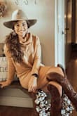 Runs a little big, but super comfortable and warm. Looks cute paired with fashion boots! - Pennie W.