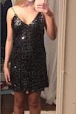 The dress was very cute. Cons- doesn't really do anything to compliment my shape and the straps slip to my shoulders a lot, likely would have fallen down if i didn't tie them together in back. Looked a little big on my butt i don't think a smaller size would have worked. Pros- pretty sparkles decent length not too short, great sparkly LBD - Casey F.