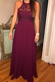 before getting this dress, the reviews said it ran a little bit large so I went with the small. This dress is classy and the lace definitely gives it some sass. I have broad shoulders, so it definitely made them look a bit smaller in this - Rachel G.
