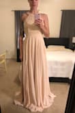 You guys!!! This dress is SO beautiful in person. Pictures do not do it justice. I'm so excited to wear it to my husband's Marine Birthday Ball in a few weeks. 

It fits perfect! True to size. I have to wear a padded bra to fill the top out- but I am very flat chested. 
It fits and hugs my curves in the most flattering way. 

It is a tiny bit sheer, so I'd suggest wearing nude panties and bra. - Taylor W.