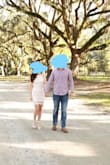 The Small fit me perfectly and worked great for our engagement photos. It's form-fitting but not too tight or too short. Very classy! (I may have been able to fit an XS but it would have been tight) - Lauren S.
