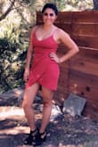I absolutely loved the fit of this dress. It's very fitted but has a little stretch which made it extremely comfortable. The front is shorter than the back which was perfect for me. - Jenevah A.