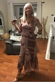 This dress is really cute. It's actually kind of fun to wear. And it fits true to size. - Keri A.
