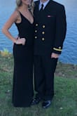 I loved this dress and got a lot of compliments on it. I wore it to a fancy evening wedding. The material was very comfortable and stretched as I moved. I would not recommend wearing a bar with the dress because of the low cut it was visible in some pictures. - Lauren B.