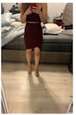 Very form fitting in all the right places. Love the peek a boo slit in the middle. Just shows enough to make it look sexy! - Kim W.
